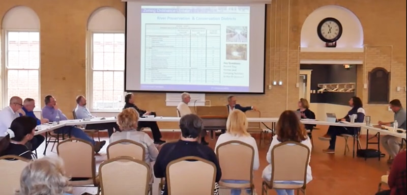 People seated at a Planning and Zoning meeting in Fort Thomas