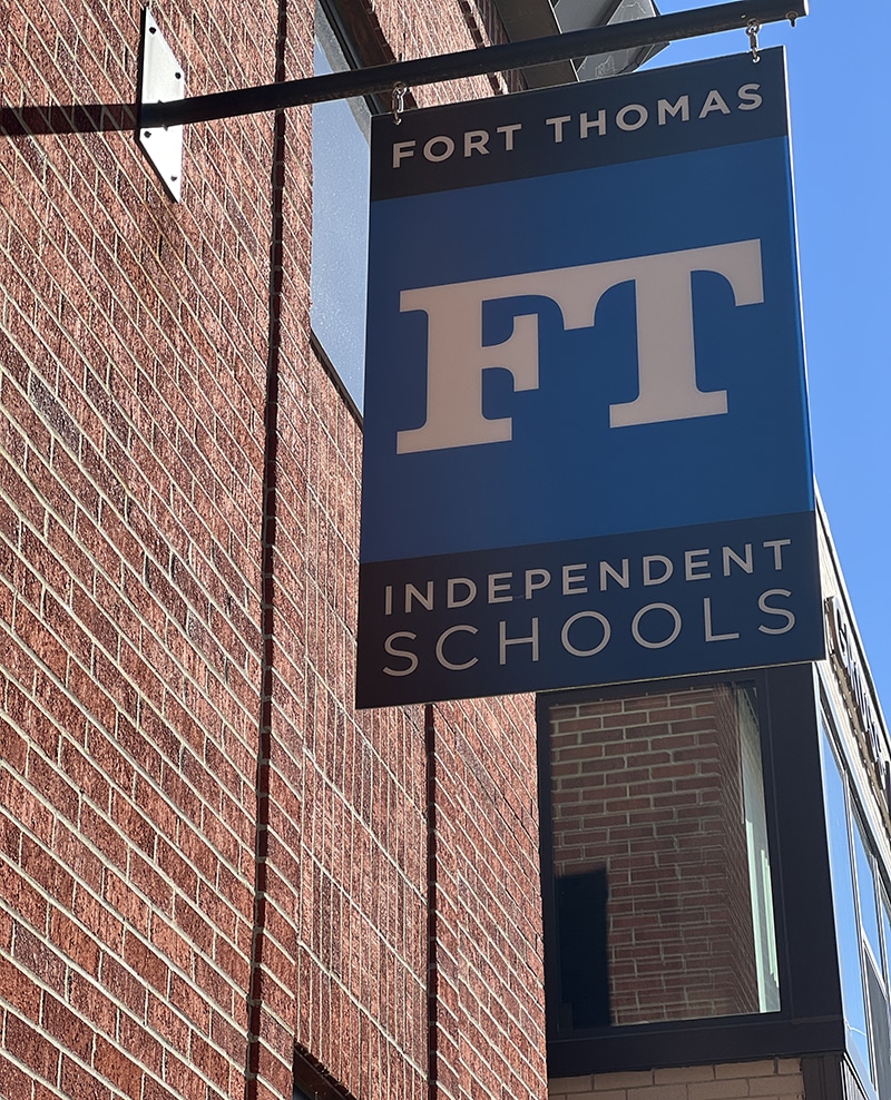 Sign on brick building for Fort Thomas Independent Schools district