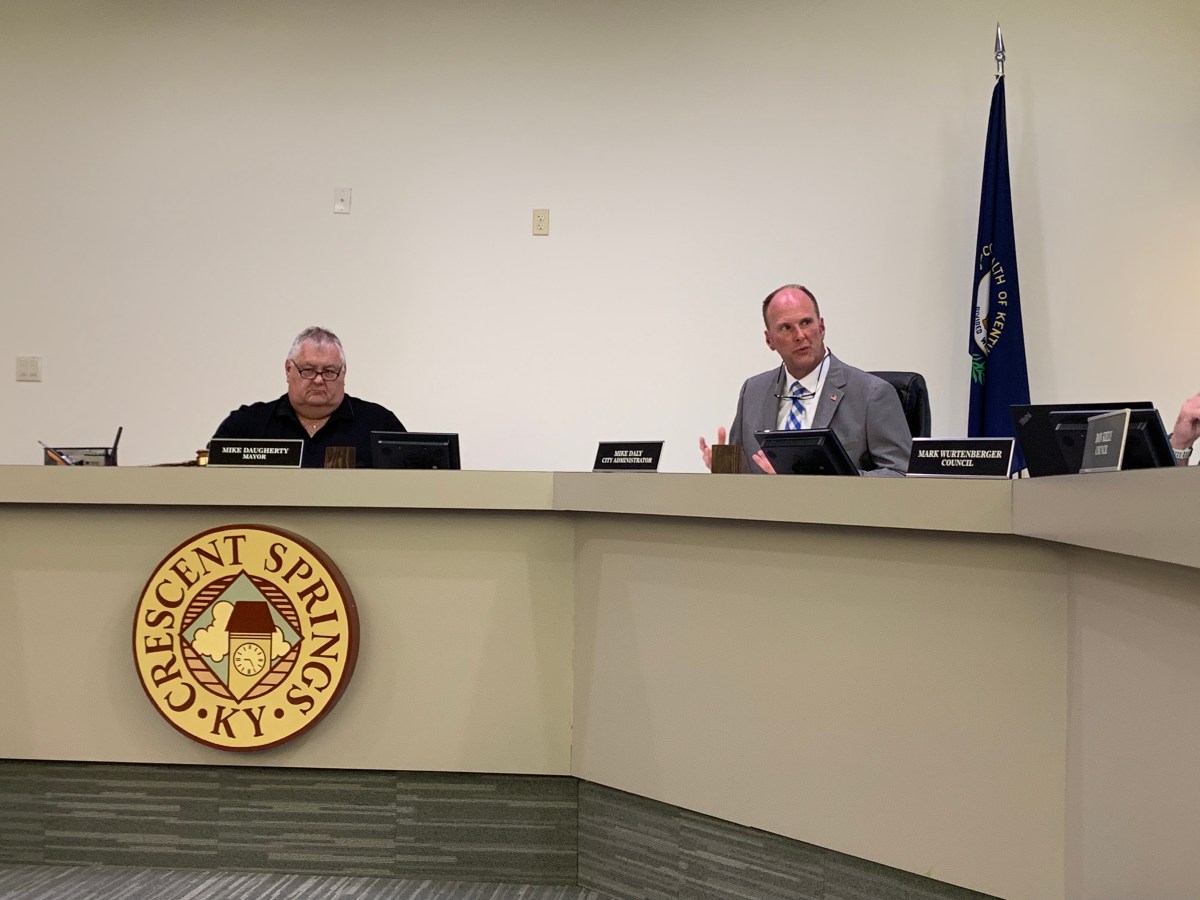 Crescent Springs Mayor Mike Daugherty and city administrator, Mike Daly sit during a city council meeting on June 26.